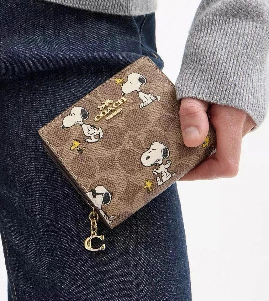 Coach X Peanuts Snap Wallet In Signature Canvas With Snoopy Print CBN32